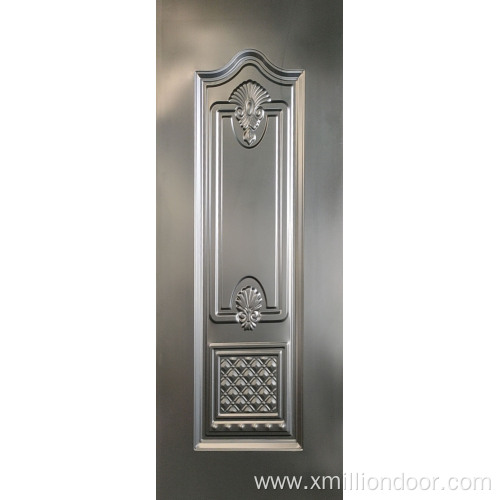 Decorative embossed steel door panel